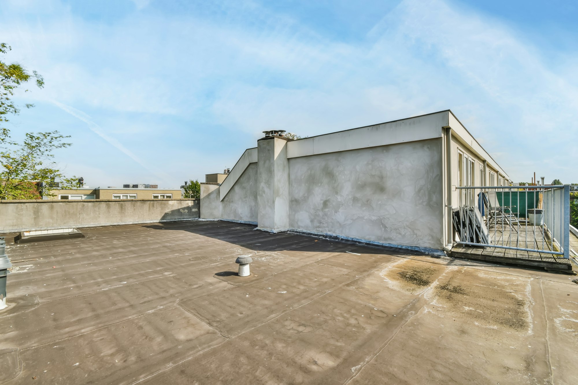RM Roofing | flat roof of a house